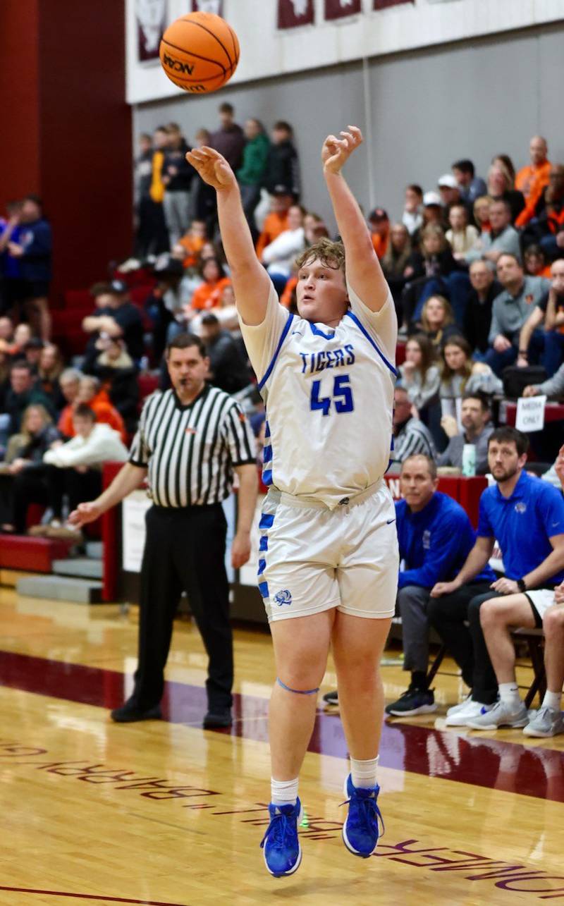 Princeton's Luke Smith makes a key 3-pointer late in Wednesday's sectional semifinals at Marengo. Princeton won 46-42 to advance to Friday's championship against Rock Falls.