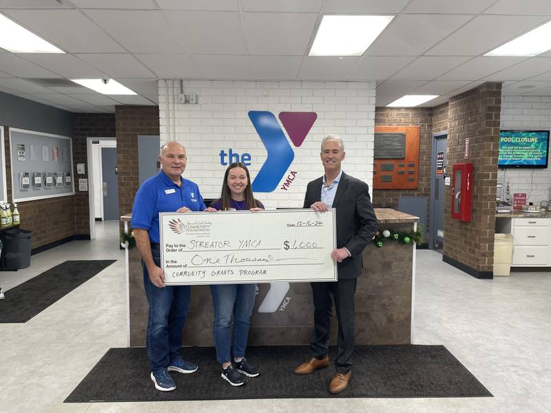 The Streator Family YMCA recently received a $1,000 community grant for its “Rock Steady Boxing to Fight Parkinson’s Disease” program from the Starved Rock Country Community Foundation. From left: Ken Beutke, YMCA Wellness Coordinator; Shannon Harback, YMCA Executive Director; and Fran Brolley, President of the Starved Rock Country Community Foundation.