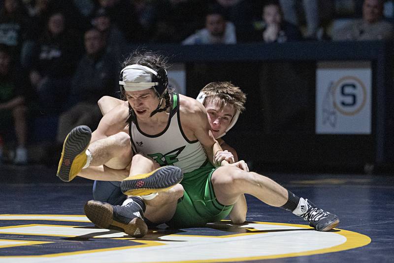 Rock Falls’ Alex Espinoza and Sterling’s Dylan Ottens face off at 138 pounds Wednesday, Dec. 21, 2022 in Sterling. Ottens won by pin.