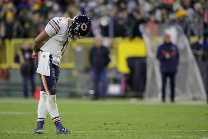 Chicago Bears quarterback Justin Fields reacts to a penalty during the second half against the Green Bay Packers on Dec. 12, 2021, in Green Bay, Wis.