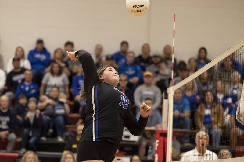 Newman’s Kennedy Rowzee spikes the ball Wednesday, Nov. 2, 2022 in the sectional championship game against River Ridge.