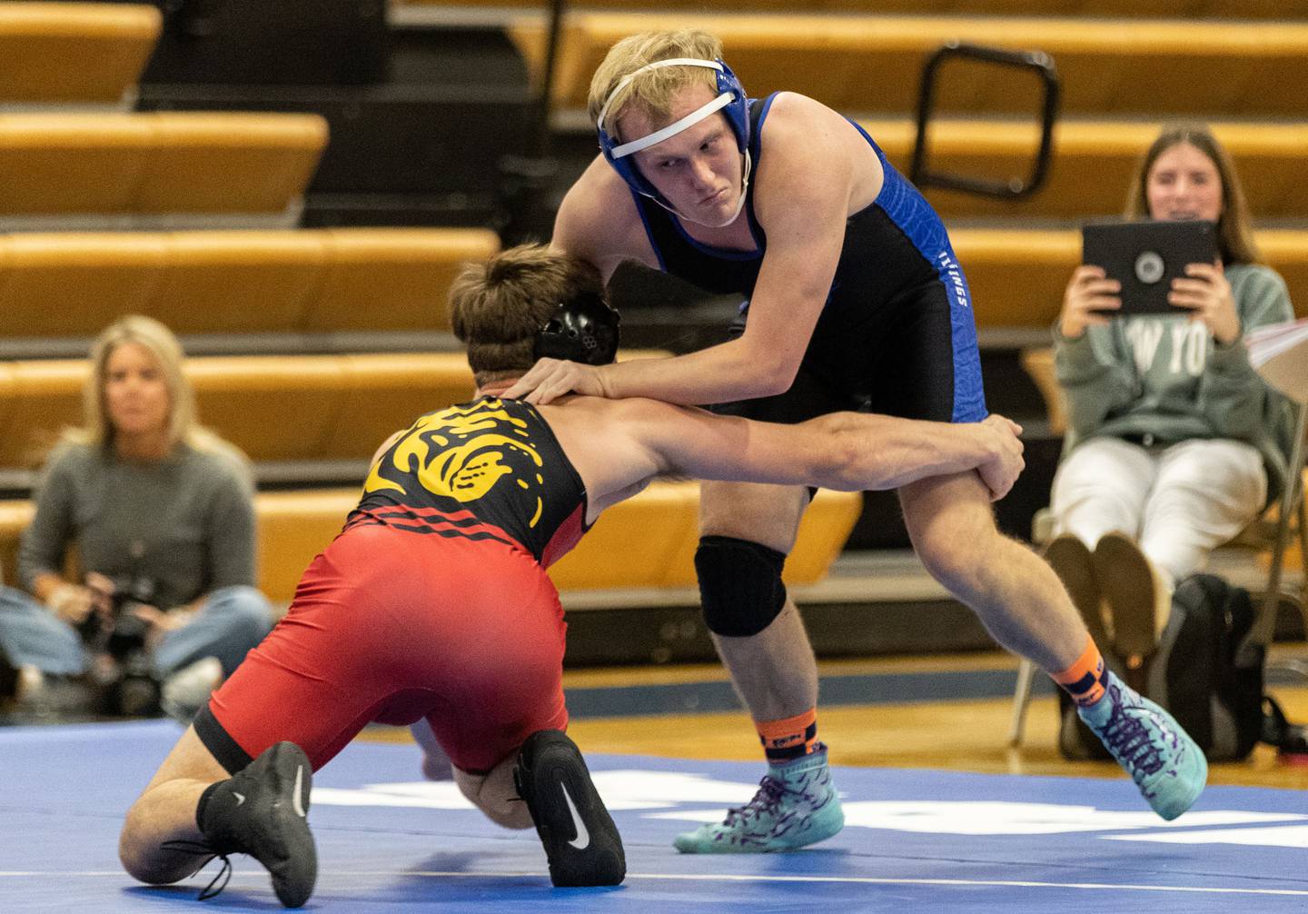 Geneva’s Dylan Kanzler wrestles with Batavia’s Colin Peyton at Geneva High School on Thursday, Dec. 19, 2024. Peyton won the match.