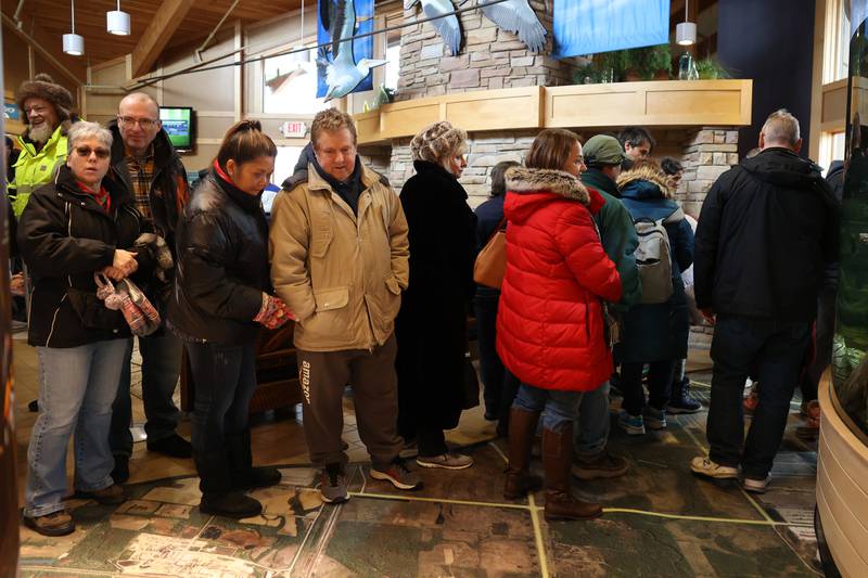 People line up for one of the bird presentations at the Four Rivers Environmental Education Center’s annual Eagle Watch program in Channahon.
