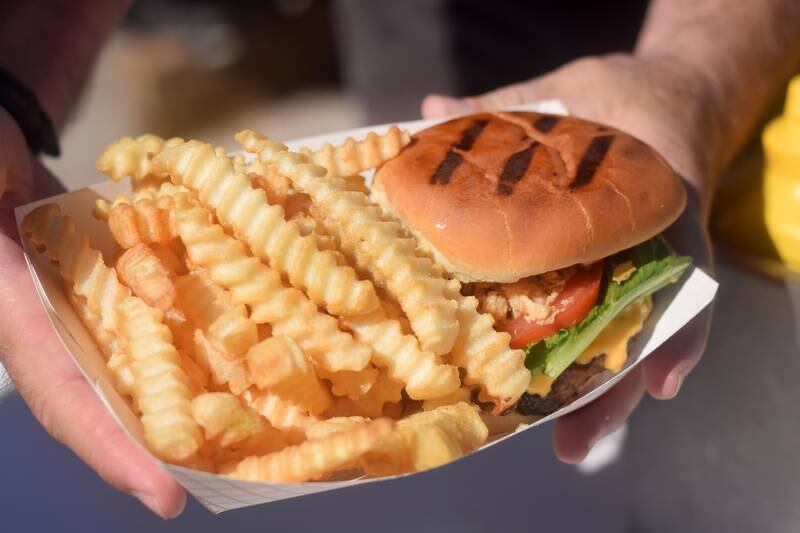 Visitors of Mineral Springs Day enjoy food truck cuisine on Sept. 24 in downtown Colfax.