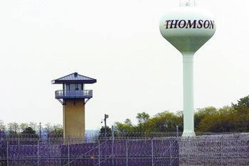 A guard station towers over the largely empty $140 million state prison in Thomson. Plans call to open it further in 2009. (Alex T. Paschal/SVN)