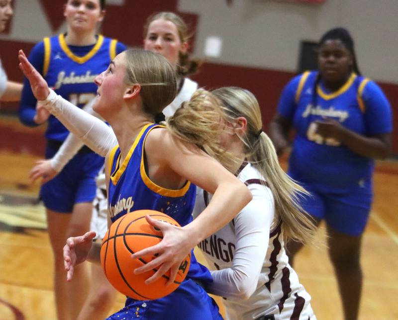 Johnsburg’s Carlie Majercik works under the hoop in varsity girls basketball on Tuesday, Jan. 6, 2026 at Homer “Bill” Barry Gymnasium on the campus of Marengo High School in Marengo.