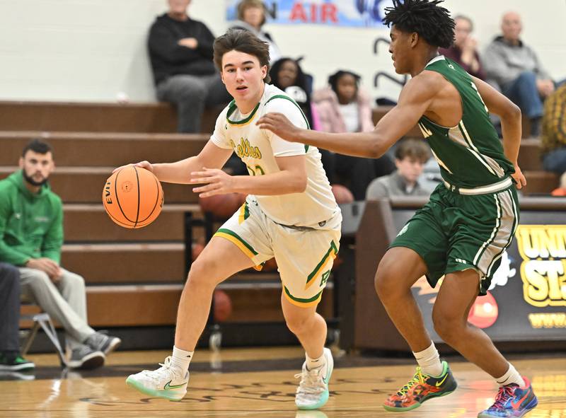 Providence Catholic's Zack Kuk (13) drives to the basket during the WJOL tournament game against Plainfield Central on Friday, NOV. 28, 2025, at Joliet.