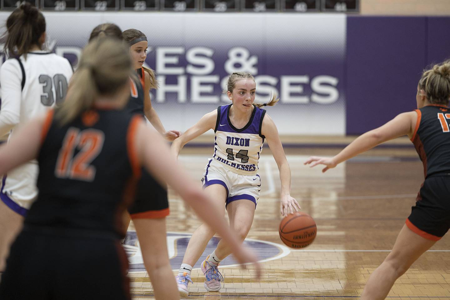 Dixon’s Abby Knipple handles the ball against Byron Tuesday, Jan. 24, 2023.