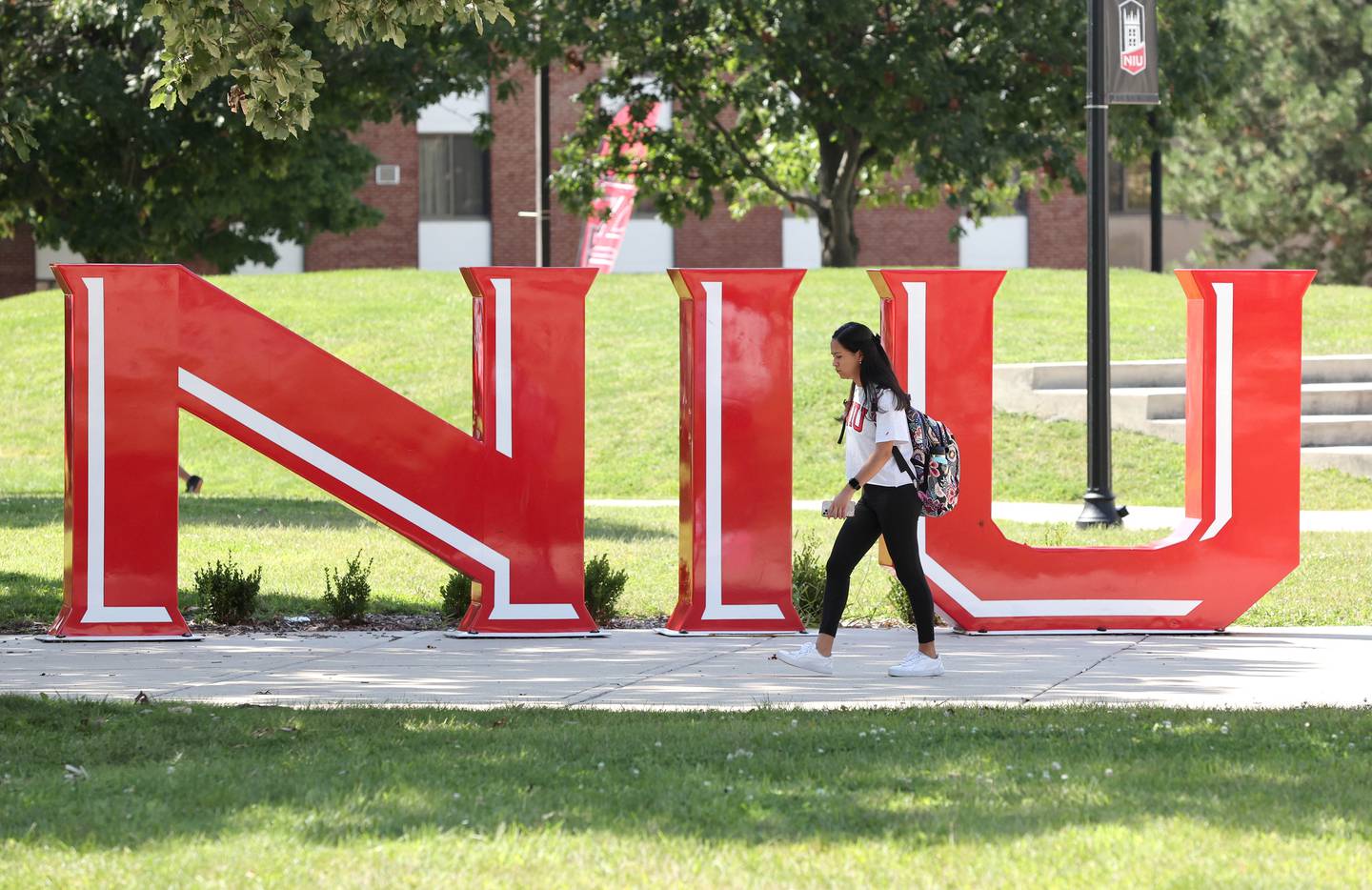 Northern Illinois University students move between classes Wednesday, Aug. 24, 2022, on campus at NIU in DeKalb.