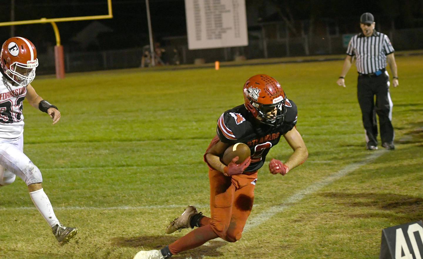 Fulton's Brock Mason makes a crucial catch along the sideline.