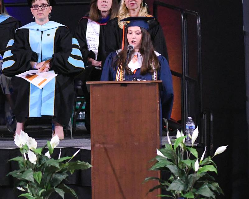 Oswego High School class vice president Jordan Trader along with class president Abby Schwab welcomes graduates and attendees during the graduation ceremony on Saturday May 17, 2025, held at the Convocation Center in DeKalb.