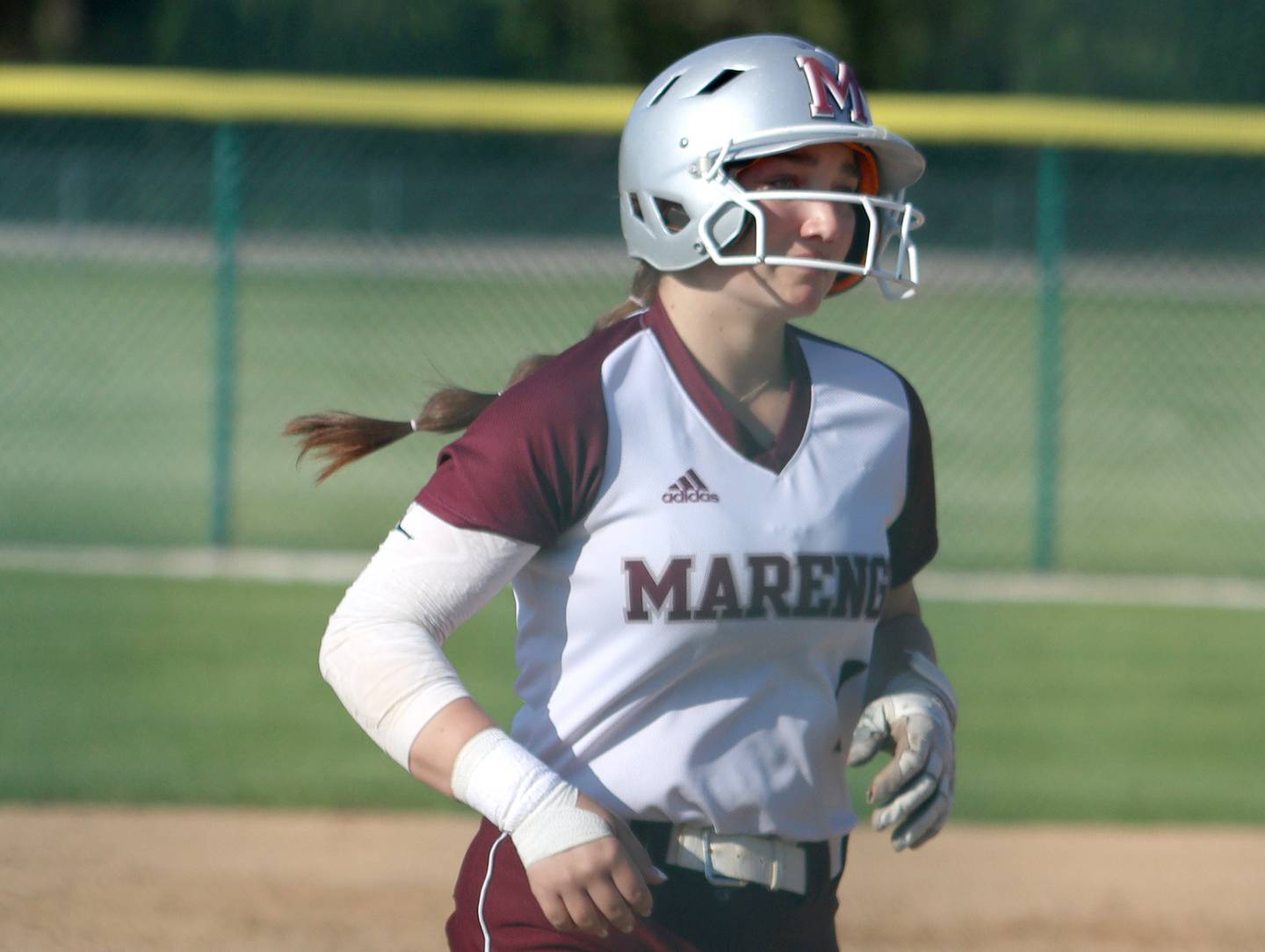 Marengo’s Gabby Christopher trots toward home on a home run against Richmond-Burton in varsity softball at Marengo Monday.