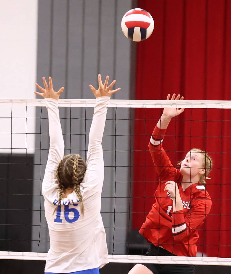Indian Creek's Allie Peterson tries to get the ball by Hinckley-Big Rock's Grace Barrett during their match Tuesday, Sept. 19, 2023, at Indian Creek High School in Shabbona.