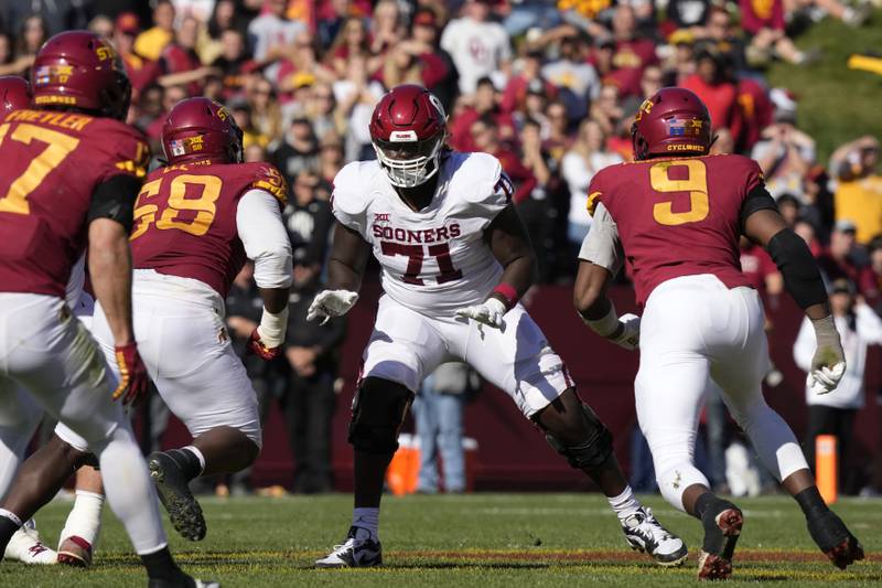 Oklahoma offensive lineman Anton Harrison looks to block during the second half against Iowa State during the 2022 season.