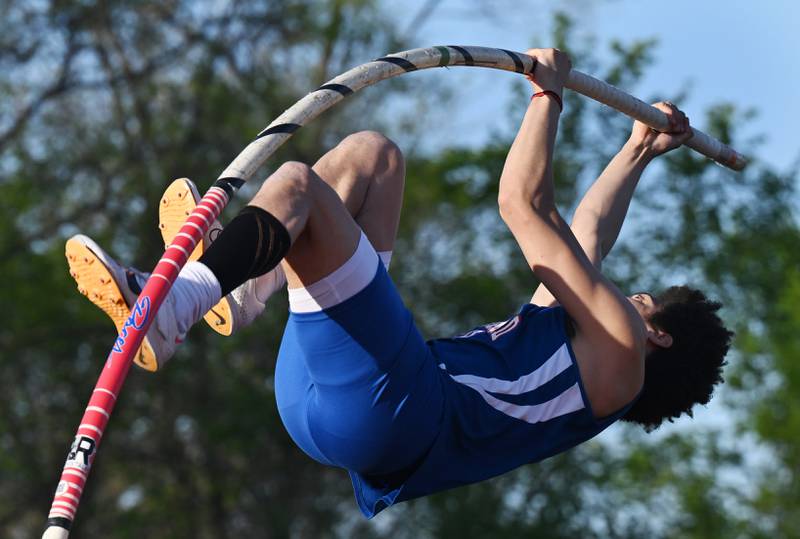 Glenbard South's Kyle Quaid-Bowman competes in pole vault on his way to a first-place finish during the DuPage County boys track and field meet at Wheaton Warrenville South High School on Friday, May 9, 2025 in Wheaton.