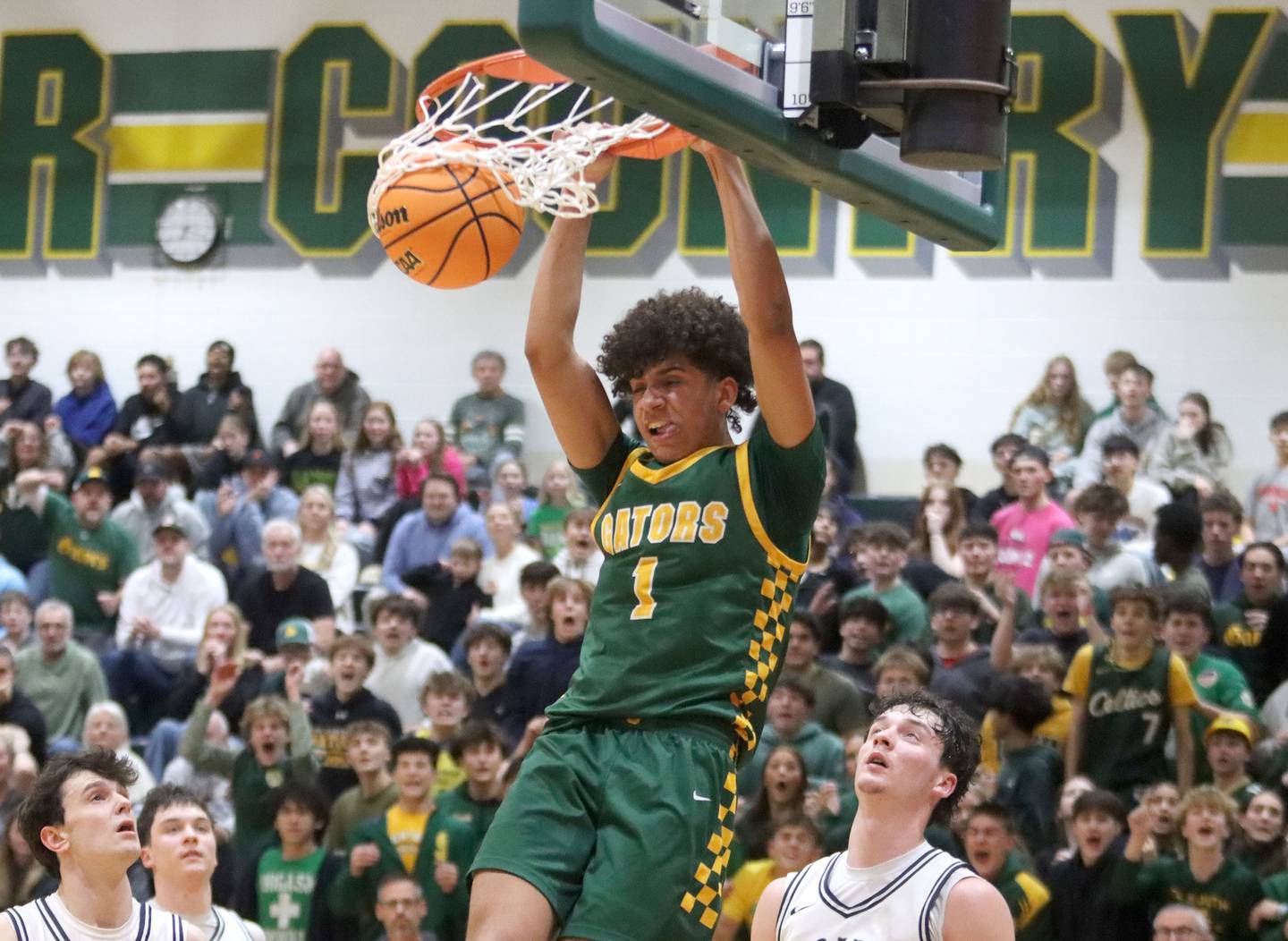 Crystal Lake South’s Noah Cook slams the ball for a fourth-quarter dunk against Cary-Grove in boys IHSA Class 3A Regional Championship basketball on Friday, Feb. 27, 2026, at Crystal Lake South High School in Crystal Lake.