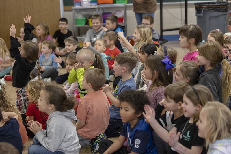 Students at St. Anne’s school in Dixon cheer on their classmates during a game Tuesday, Jan. 30, 2024. St. Anne’s spent a few hours of fun for the day in celebration of Catholic Schools Week. Typically the four Catholic elementary schools would meet at Newman High School for an all schools' Mass. The Mass this year has been postponed until April, when weather is not expected to be a factor.