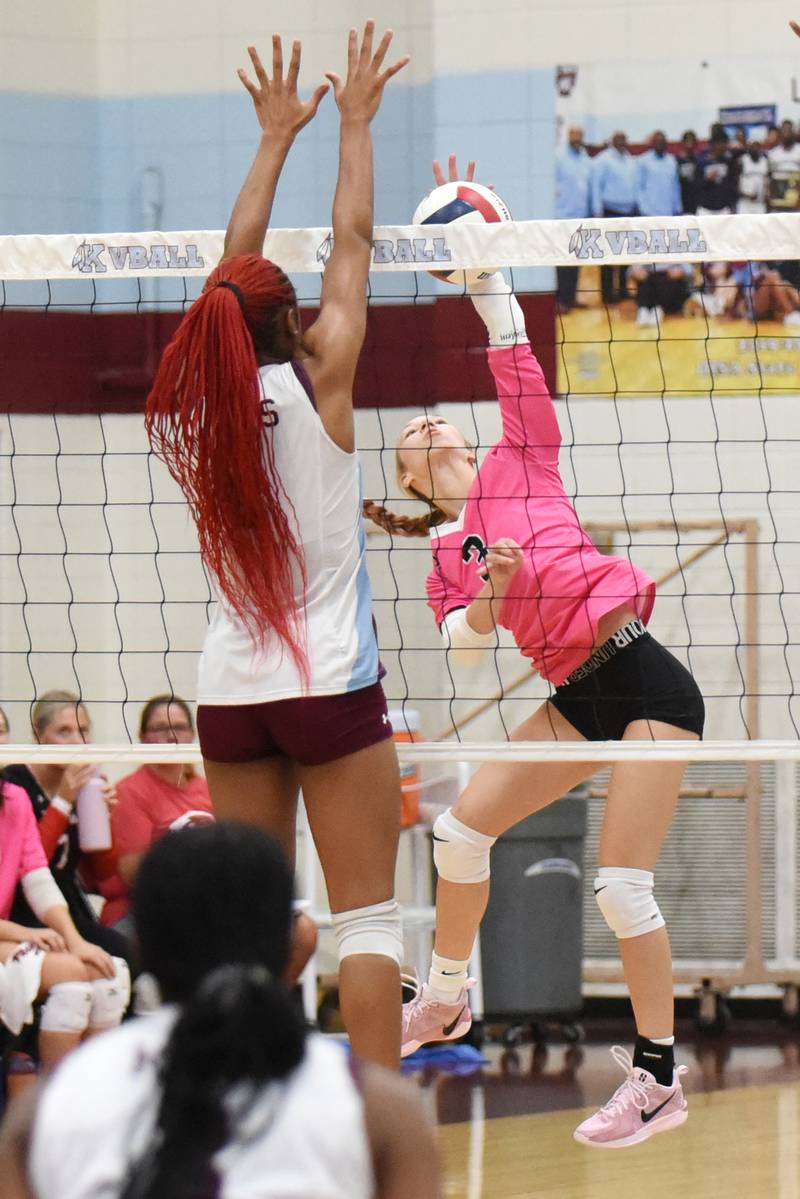 Bradley-Bourbonnais' Samantha Harsy, right, attempts to put a hit past Kankakee's Ki'Asia Wilson during All-City action at Kankakee Tuesday, Sept. 9, 2025.