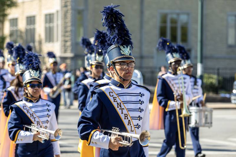 Jeremy Lannan walks with Joliet Central’s marching band during the homecoming parade on Sept. 27. 2025.
