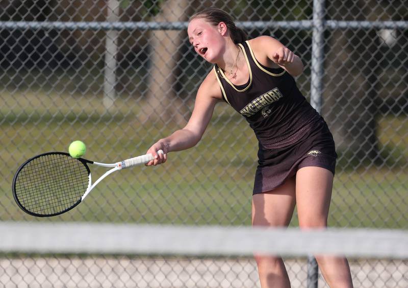 Sycamore’s Morgan Cook hits a shot during her match against DeKalb Wednesday, Sept. 18, 2024, at Sycamore High School.