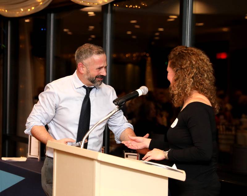 Zach Norbut accepts the 2023 Geneva Chamber of Commerce New Member of the Year Award during the chamber’s annual dinner and awards at Riverside Receptions in Geneva on Thursday, Nov. 2, 2023.