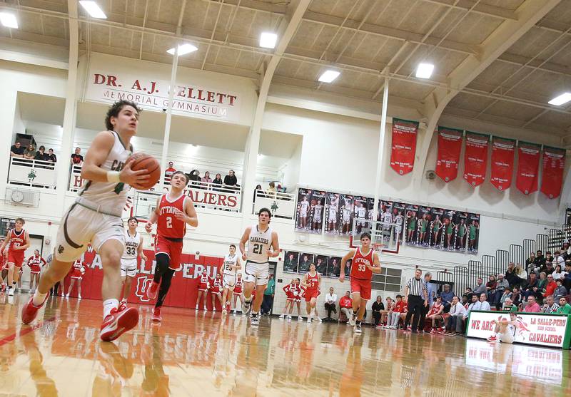 L-P's Jack Jereb runs in all alone to score a basket against Ottawa on Friday, Jan. 5, 2024 at Sellett Gymnasium.