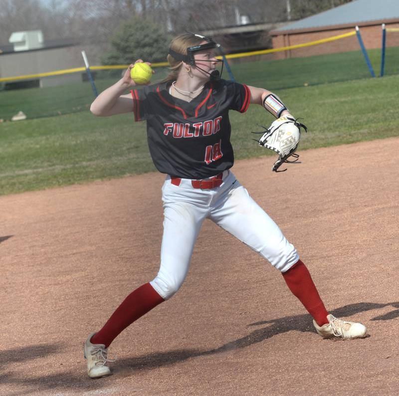 Fulton third baseman Hailey Smither prepares to throw to first for an out against Milledgeville at the Pearl City Tournament on Saturday, April 12, 2025.