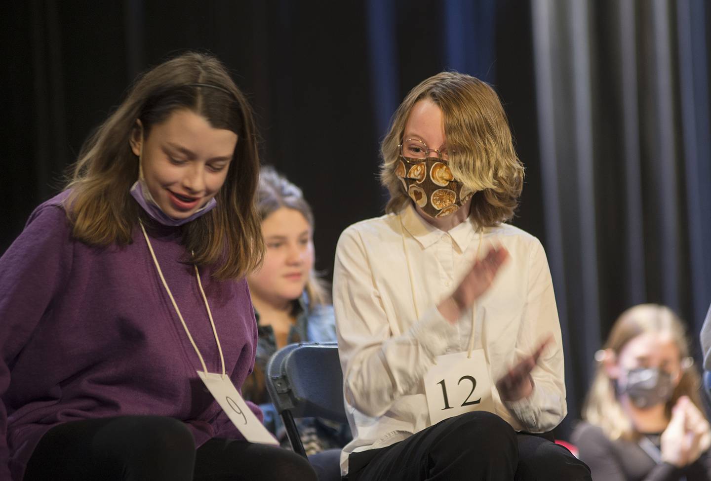 Jake Andrzejewski of East Coloma-Nelson Elementary celebrates bee winner Merit Namaste Rose (left) in the Lee-Ogle-Whiteside Regional Spelling Bee Thursday, Feb. 24, 2022. Andrzejewski came in second and misspelled the word “recuperation.”
