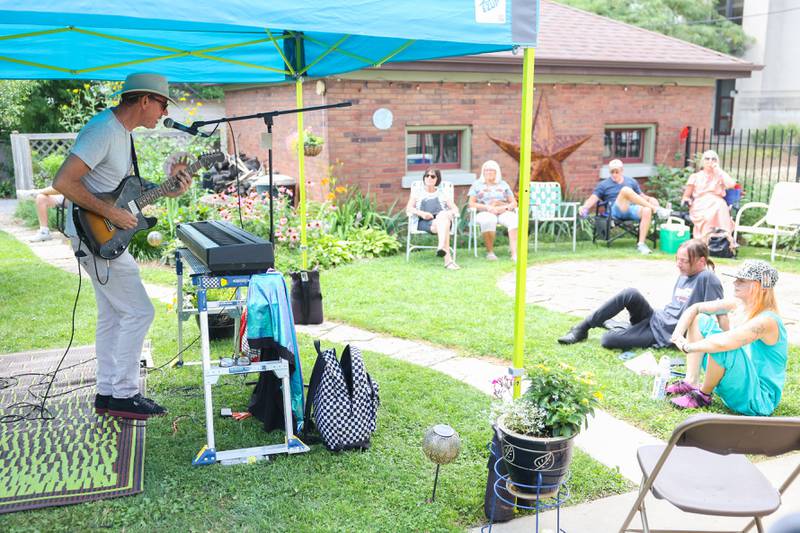 JRoss Green perform in the backyard of 361 Wilcox St.. The Upper Bluff Historic District hosted Porch & Park Music Fest featuring a variety of musical artist at five different locations. Saturday, July 30, 2022 in Joliet.