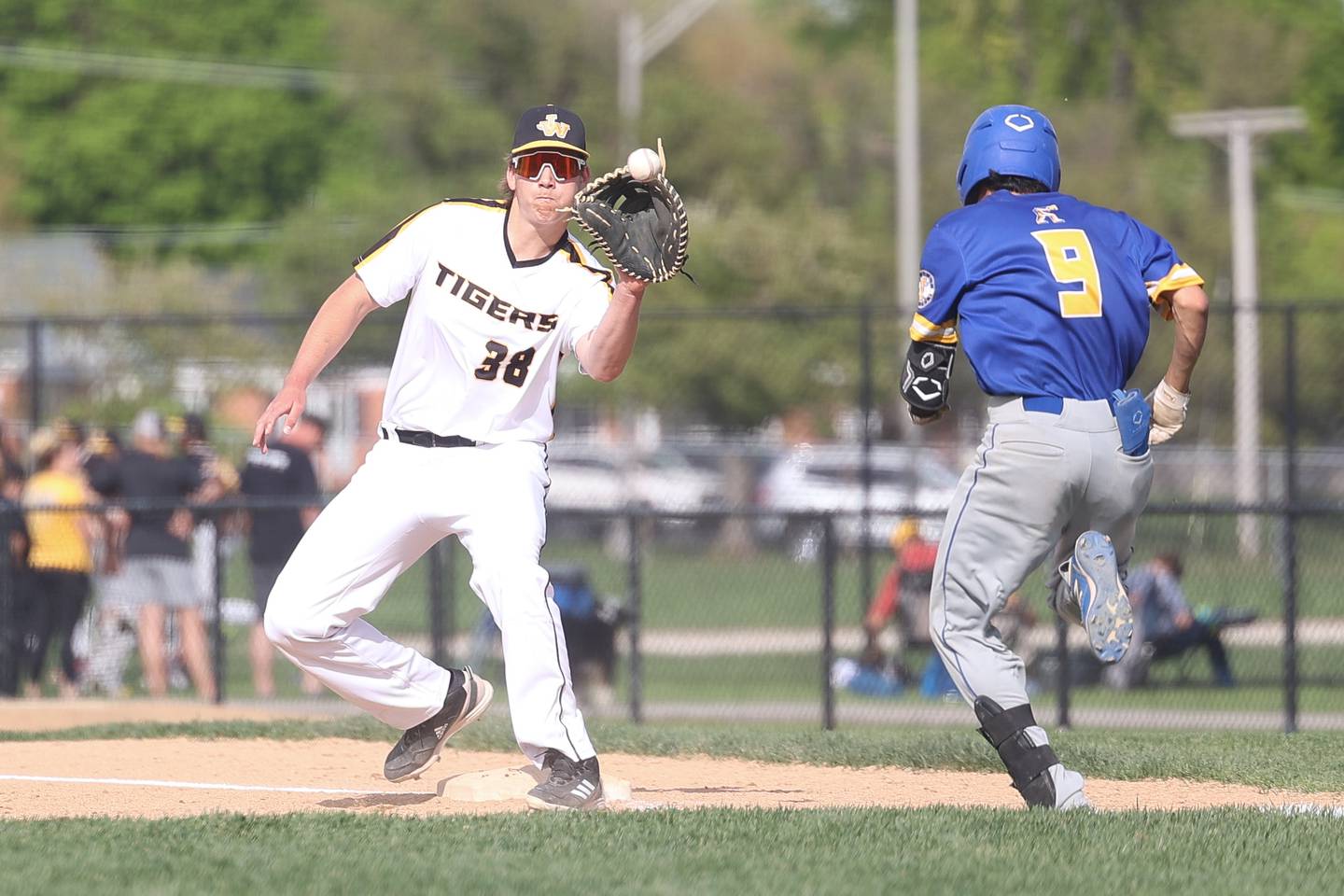 Joliet West’s Zackry Tarrant fields the throw for the out against Joliet Central on Tuesday, May 9, 2023 in Joliet.