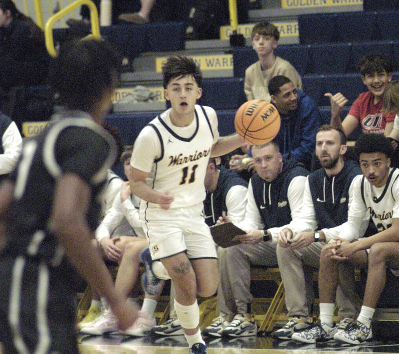 Sterling's Nico Battaglia drives the ball upcourt. Sterling Boys Basketball hosted Galesburg at Musgrove Fieldhouse on February 11, 2025