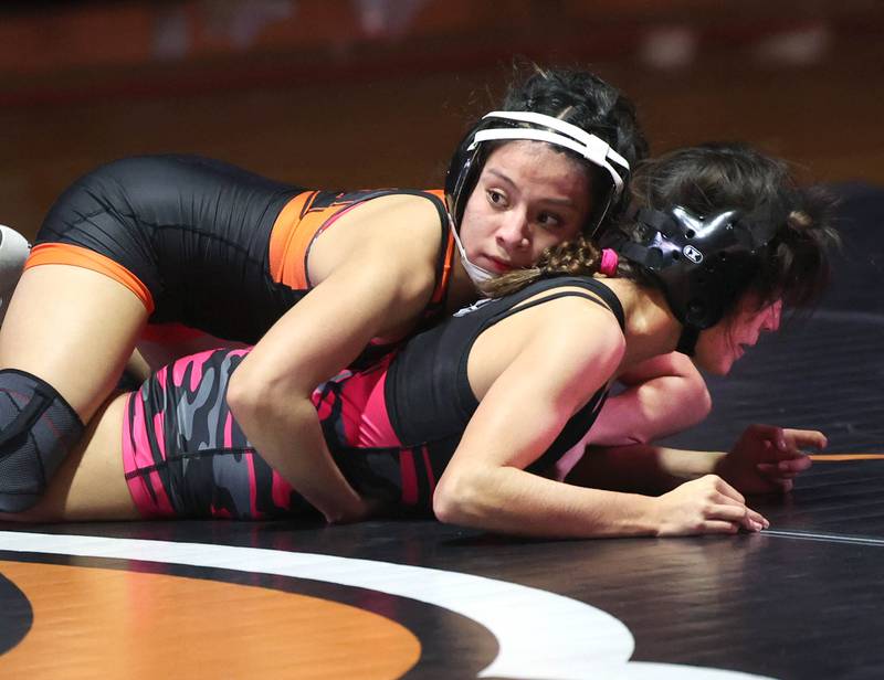 DeKalb’s Larisza Gomez Guevara controls Kaneland’s Thalia Paton during their 110 pound match Wednesday, Jan. 7, 2026, at DeKalb High School.