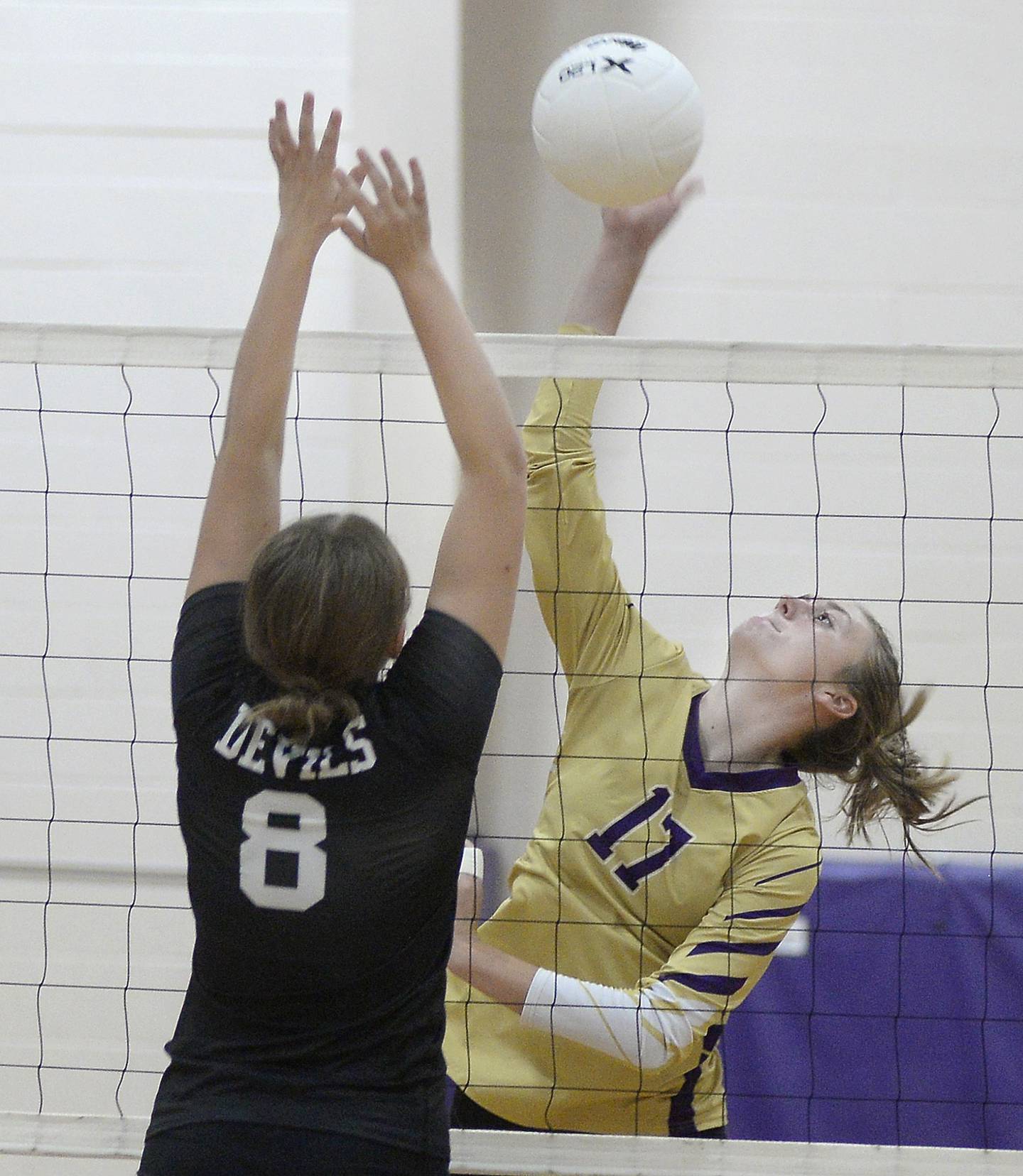 Serena’s Kendall Whiteaker tips a shot past Hall’s Mia McLaughlin first game Thursday at Serena.