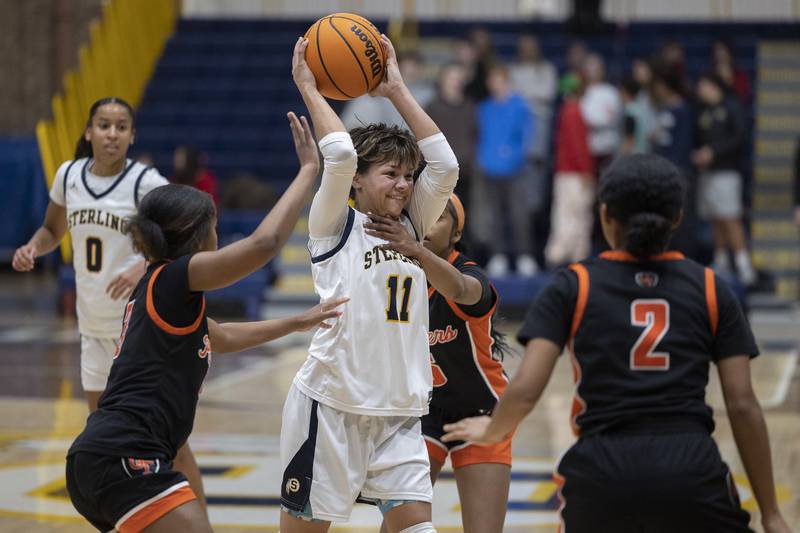 Sterling’s Joslynn James looks to make a pass against United Township Thursday, Dec. 18, 2025.