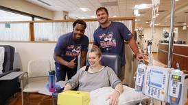 Bears players deliver care packages to patients at Advocate Infusion Center