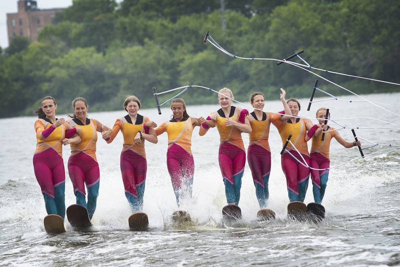 The Ski Broncs Water Ski ballet line comes in for a landing after performing a series of coordinated moves Saturday, July 16, 2022 in Rock Falls.