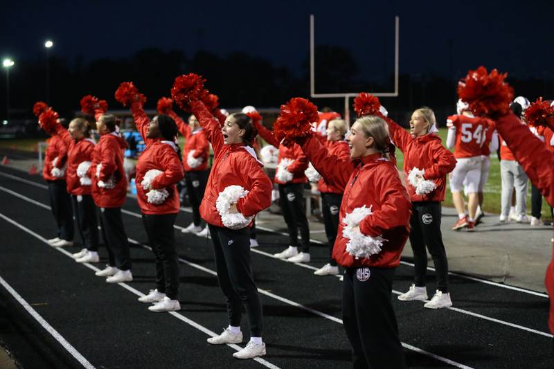 Ottawa cheerleaders perform between quarters during the football game against Morris on Friday, Oct. 13, 2023 at King Field.