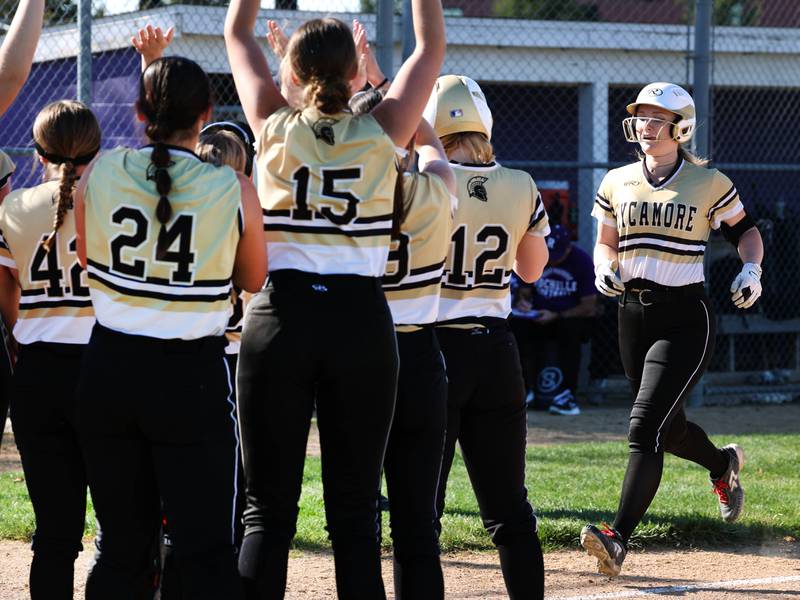Sycamore's Ellison Hallahan trots home after the first of her two home runs Monday, April 15, 2024, during their game against Rochelle at Rochelle High School.
