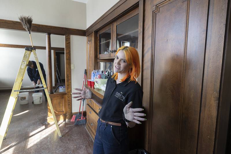 Newly hired theater manager Tori Highley speaks easily about a hopeful use for an apartment at The Dixon during a tour Tuesday, Feb. 18, 2025.