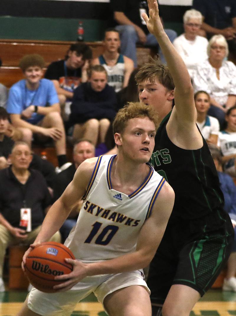 Johnsburg's Ben Person drives to the basket against Alden-Hebron’s Nolan Vanderstappen during the boy’s game of McHenry County Area All-Star Basketball Extravaganza on Sunday, April 14, 2024, at Alden-Hebron’s Tigard Gymnasium in Hebron.