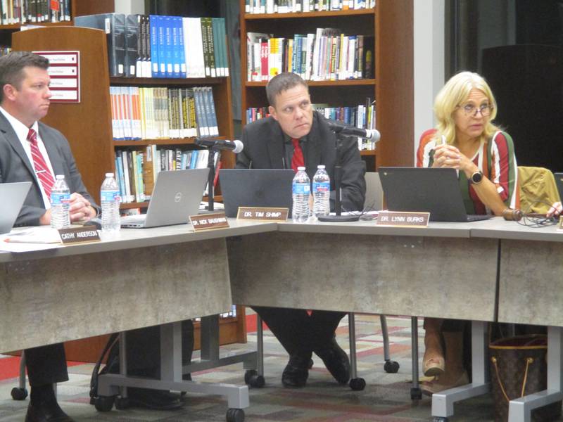 Yorkville School District Y115 officials listen to a budget presentation on Sept. 26, 2022 at the high school library. They are, from left, Associate Superintendent Nick Baughman, Superintendent Tim Shimp and school board President Lynn Burks.