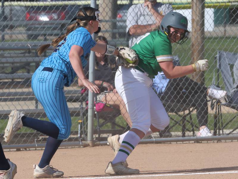 Marquette pitcher Kinley Rick tags out Seneca's Camryn Stecken in a run down between home and third base on Monday, May 11, 2026 at June Gross Field in Ottawa.