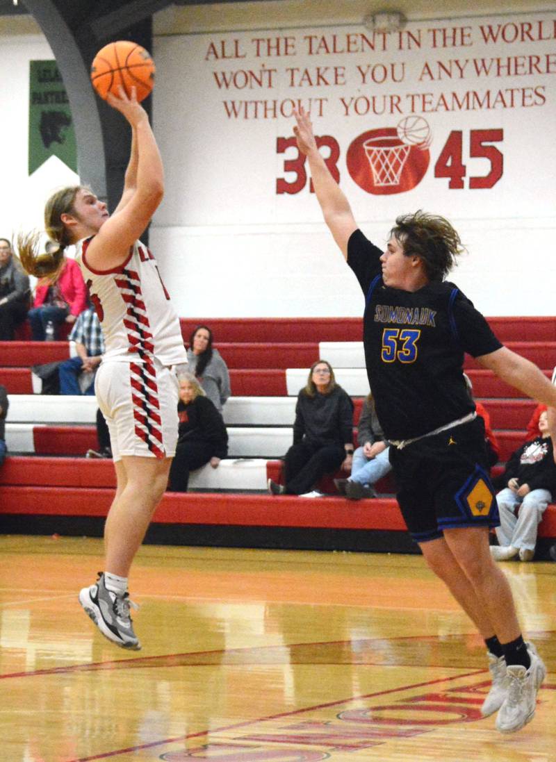 LaMoille's Wyatt File shoots against Somonauk Friday night at Dean Madsen Gymnasium in LaMoille. The visiting Bobcats won 63-44.