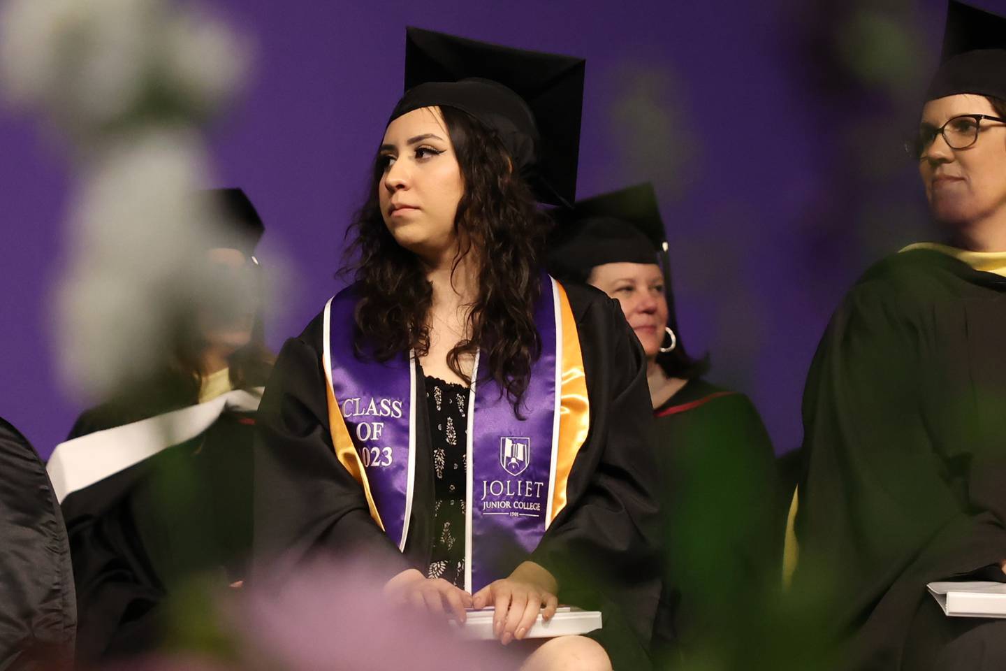 Andrea Barron sits on the stage during the Joliet Junior College Commencement Ceremony on Friday, May 19, 2023, in Joliet.