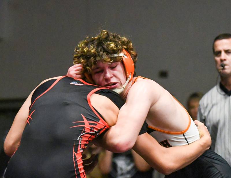 Nolan BoBee of Sandwich goes head to head with an Stillman Valley wrestler during the 152 weight class on Saturday Dec. 10th where he took the 3rd at the Plano Reaper wrestling classic held at Plano High School