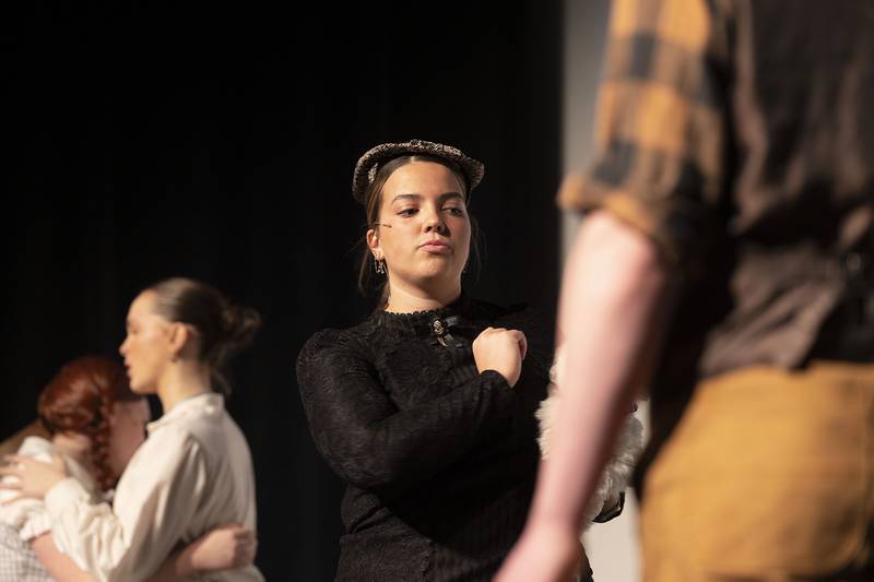Hannah Britt, playing Miss Almira Gulch, rehearses a scene for Newman’s “The Wizard of Oz” Wednesday, April 9, 2025.