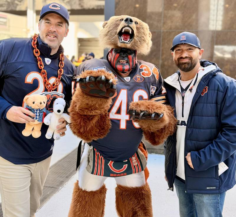 Plainfield resident Don Wachter, known as the Bearman, visits with Chicago Bears fans.
