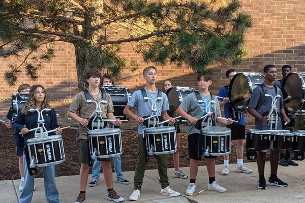Oswego students march into a new school year