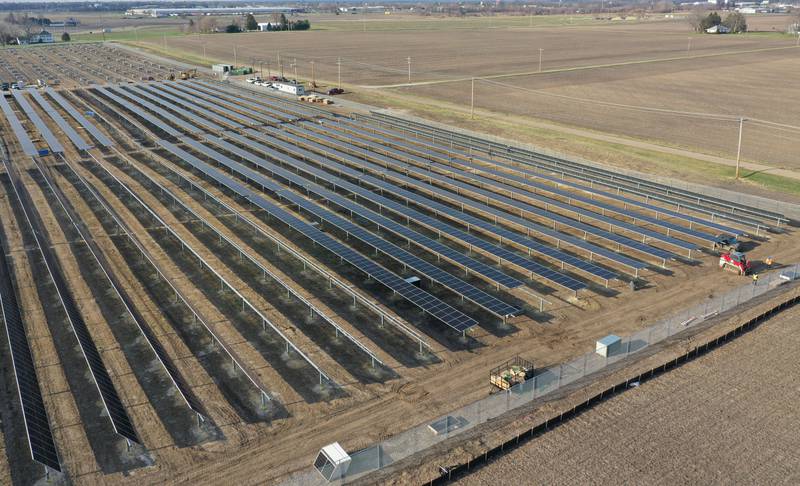 Crews build solar panels for Saliva Solar LLC near the intersection of County Road 1800 North and County Road 2100 East Street on Monday, March 30, 2026 north of Princeton. The solar farm will be a 5-megawatt commercial solar energy facility on 30 acres. When completed, it will provide enough electricity to power 1,100 homes.