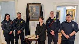 Princeton firefighters visit portraits exhibit at Bureau County History Center, exhibit to run to July 26